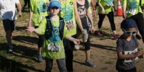 blog-theyre-wrong-and-you-can-prove-it People walking with Miles for Migraine tshirts on